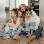 Shannon Willardson with kids smiling and laughing in their home all that nutrition