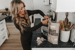 Shannon scooping chocolate protein powder